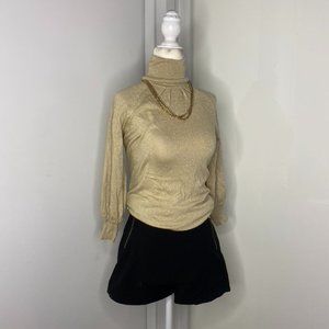 Gold turtleneck